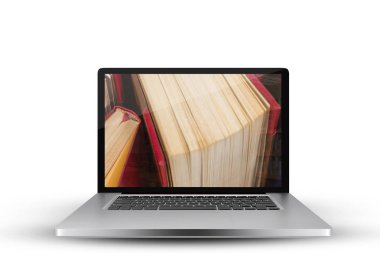 Birlikte laptop ekran karşı çeşitli ciltli kitap ile