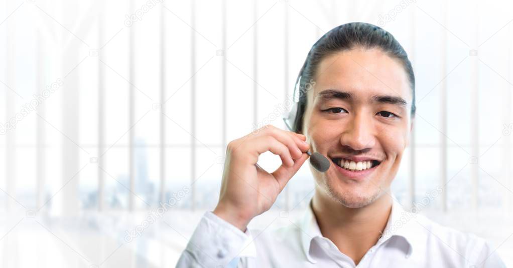 Digital composite of Customer service man with bright background in call center