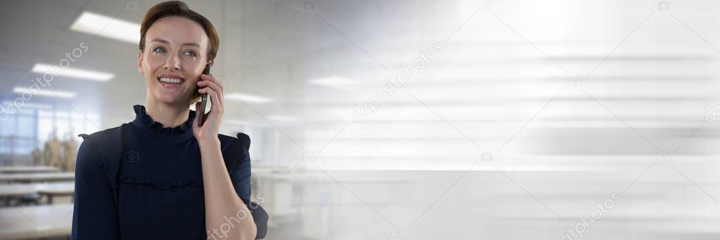 Digital composite of Businesswoman on phone in office factory with transition