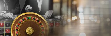 Digital composite of Roulette wheel in casino clipart