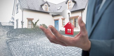 Midsection ev kroki karşı zarif işadamı