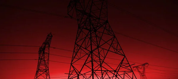 Βράδυ Σιλουέτα Πυλώνων Ηλεκτρικής Ενέργειας — Φωτογραφία Αρχείου