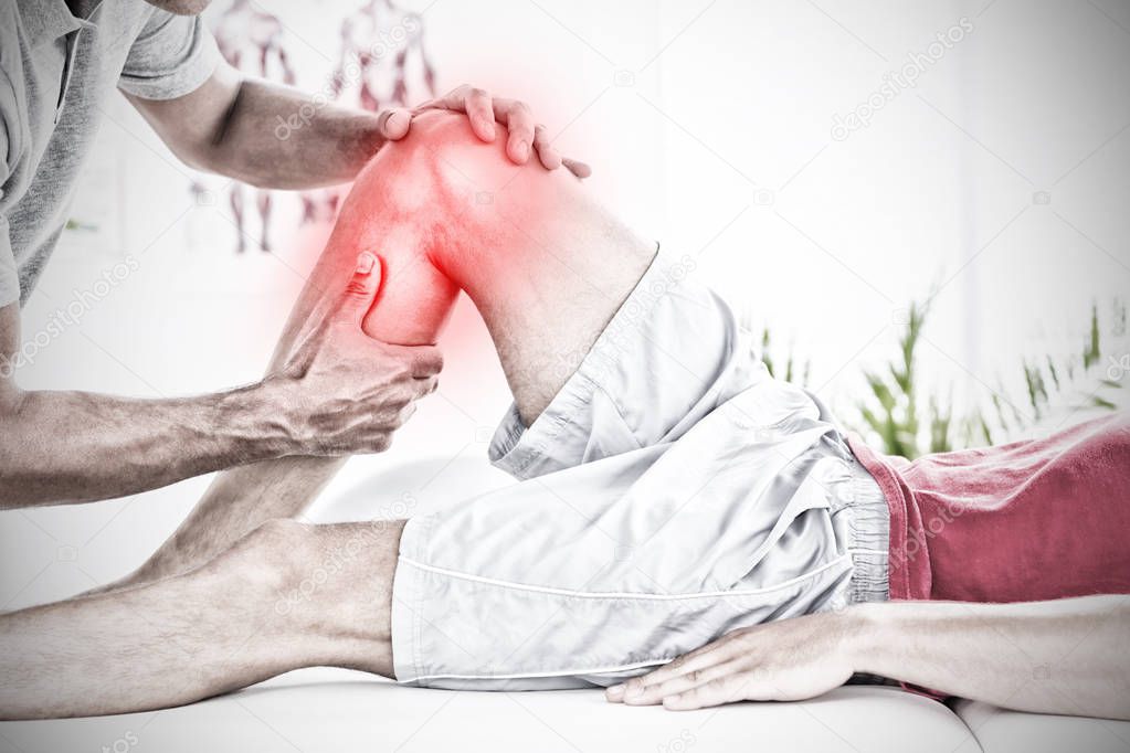 Highlighted pain against male physical therapist massaging patient calf muscle