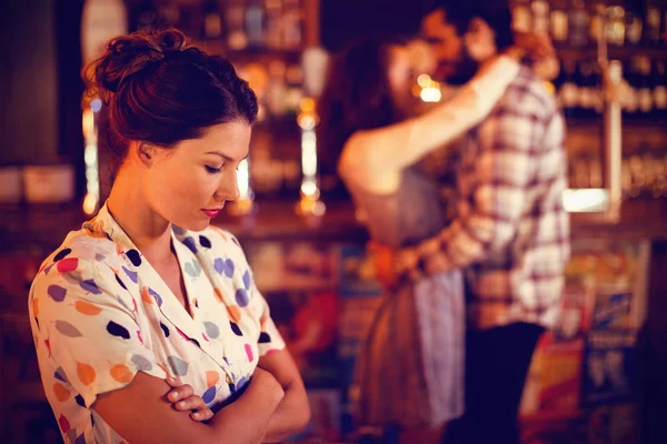 Upset Woman Ignoring Affectionate Couple Pub — Stock Photo, Image