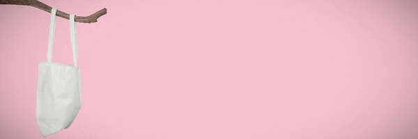 帆布袋反对粉红色背景 — 图库照片
