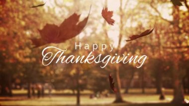 Şükran günün kutlu olsun metnin düşen yaprakları üzerinde dijital olarak oluşturulan video