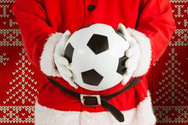 Noel Baba kırmızı Dikişsiz örgü desen karşı bir futbol holding