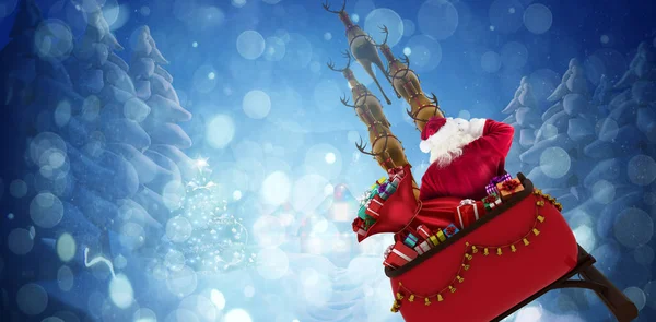 Achteraanzicht Van Santa Claus Rijden Slee Tegen Winter Dorp — Stockfoto