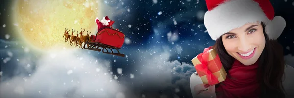 Happy Brunette Holding Christmas Gift Stars Twinkling Night Sky — Stock Photo, Image