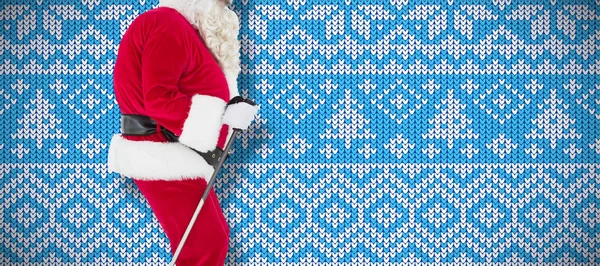 Праздничный Отец Рождество Катается Лыжах Против Вязания Рождественского Фона Снежинки — стоковое фото