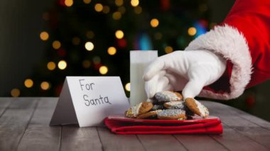 Kurabiye ve süt Noel ağacı ışıkları tarafından yemek Santa dijital bileşik