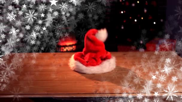 Digital Composite Santa Hat Falling Table — Stock Video