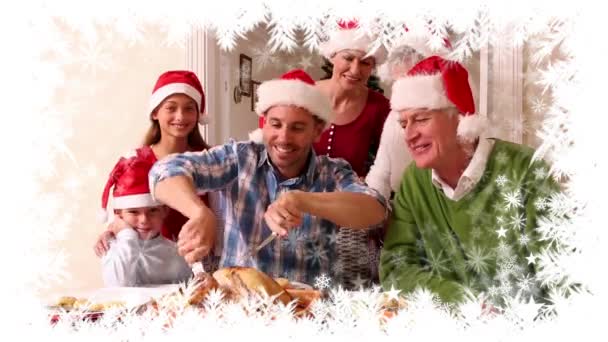 家庭圣诞节晚餐与雪花边框的数字复合 — 图库视频影像