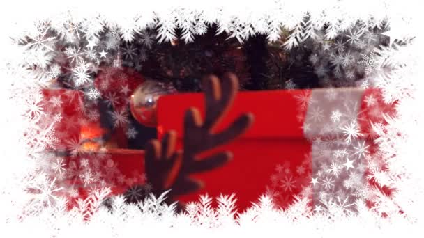 圣诞树下圣诞节雪花边框的数字合成 — 图库视频影像