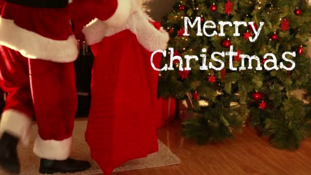 Digitális kompozit Merry Christmas szöveg és a télapó ajándékozás
