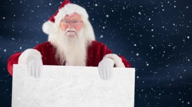 Noel Baba yağan kar ile kombine bir işaret tutan dijital bileşik