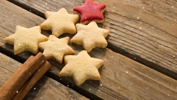 Composto Digital Queda Neve Com Biscoitos Natal — Vídeo de Stock