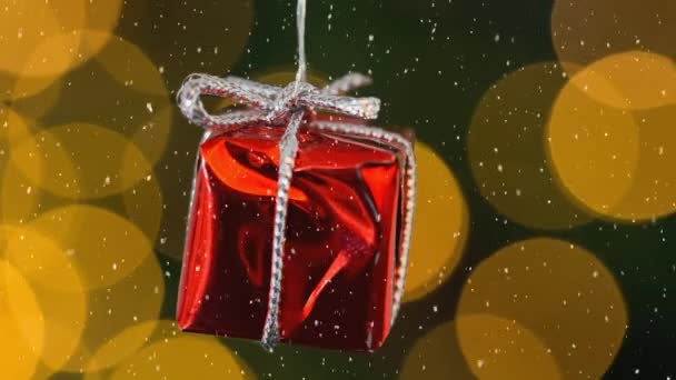 Digitaler Verbund Aus Fallendem Schnee Und Weihnachtsgeschenkdekoration — Stockvideo