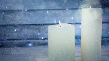 Düşen kar ile birlikte mum dijital bileşik