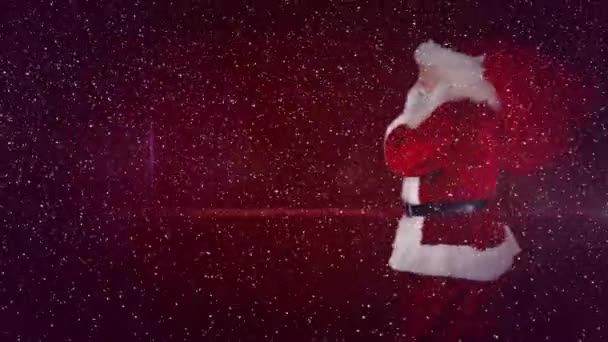 Composición Vídeo Con Nieve Cayendo Sobre Santa Caminando Con Saco — Vídeos de Stock