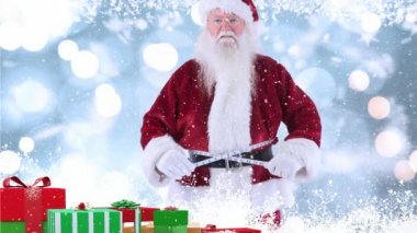 Dijital bileşik yan tümcesiyle birlikte Noel hediyeler Santa düşen kar ile kombine