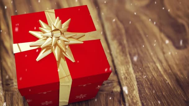 Compuesto Digital Nieve Cayendo Con Regalo Navidad — Vídeos de Stock