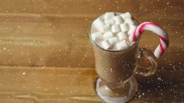 クリスマス ホット チョコレートとマシュマロと立ち下がり雪のデジタル合成 — ストック動画