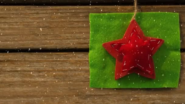 Compuesto Digital Nieve Que Cae Con Decoración Estrella Navidad — Vídeos de Stock