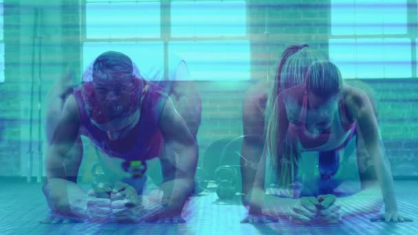 Composto Digital Fit Couple Exercitando Estúdio Fitness — Vídeo de Stock