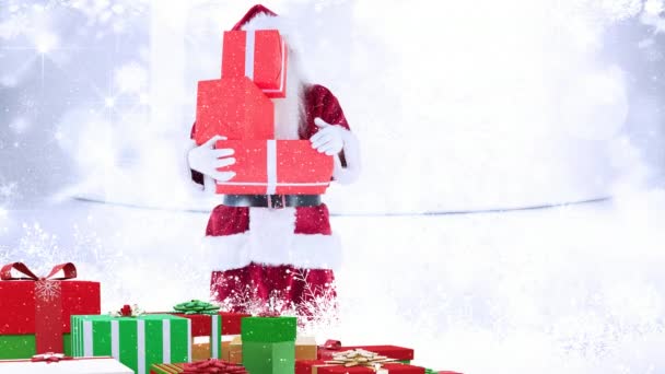 Digital Composite Santa Clause Holding Christmas Presents Combined Falling Snow — Stock Video