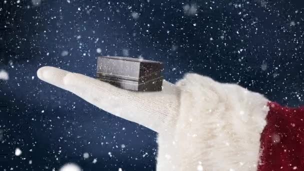 Цифровая Композиция Санта Клауса Подарком Руке Сочетании Падающим Снегом — стоковое видео