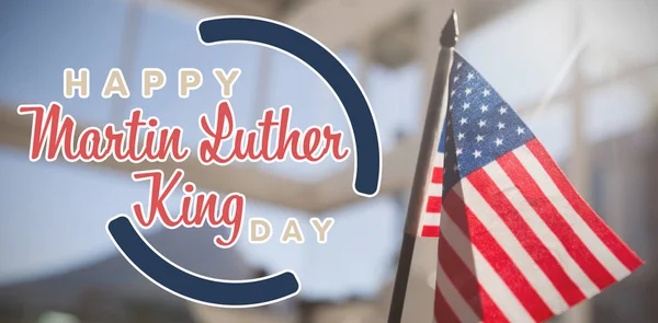 happy Martin Luther King day against american national flag in restaurant