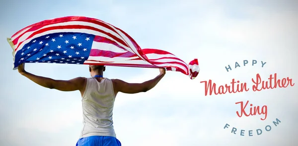 Visão Traseira Desportista Segurando Bandeira Americana Contra Céu Azul Com — Fotografia de Stock