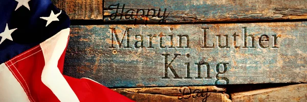 古い木製のテーブルにアメリカ国旗に対して幸せマーティン ルーサー キング日 — ストック写真