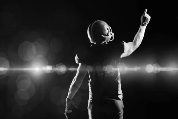 Rear View American Football Player Helmet Pointing Upwards Stock Picture