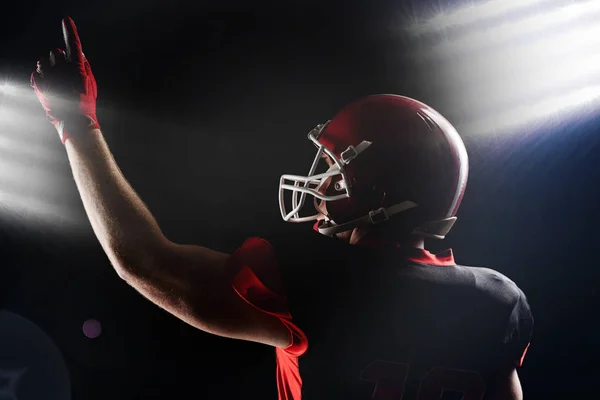 Rear View American Football Player Helmet Pointing Upwards Royalty Free Stock Images