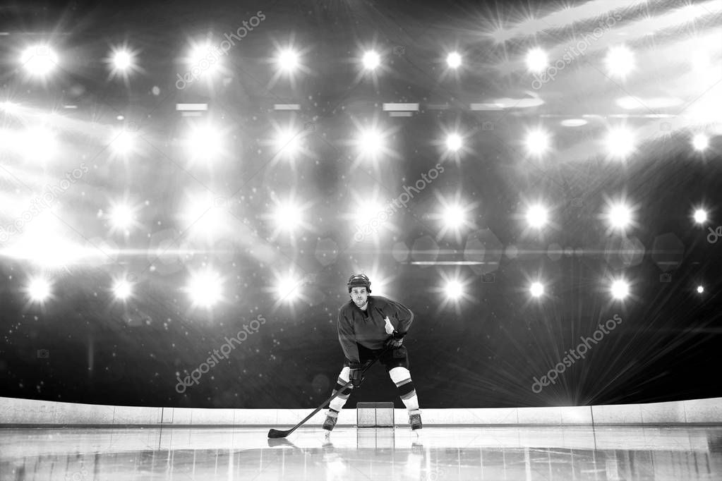 Player playing ice hockey against composite image of spotlight