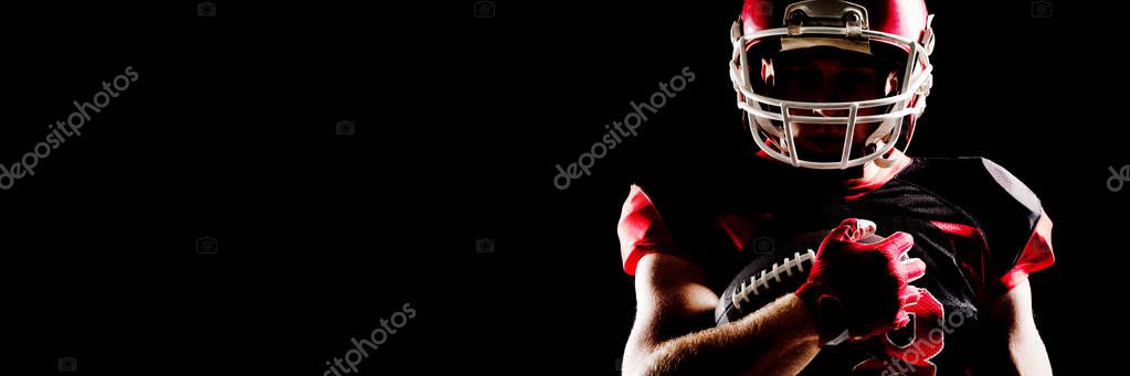 American Football Player Helmet Holding Rugby Ball Black Background Stock Photo