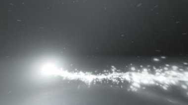 Parlayan beyaz Noel ile koyu arka plan üzerinde hareketli ışık kıvılcım ve trails