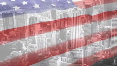 Amerikan bayrağı sallanan dijital animasyon. Cityscape arka planda 