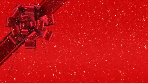Digitální Animace Červenou Stuhou Mašlí Dárkové Červené Pozadí Sněžení Popředí — Stock video