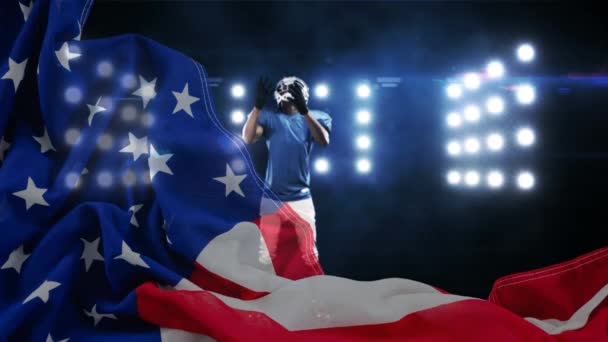 美国橄榄球运动员在体育场接球的数字动画 前景中的美国国旗 — 图库视频影像