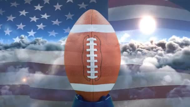 Digital Animation Rugby Boll Och Svajande Amerikanska Flaggan Moln Som — Stockvideo