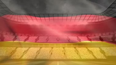 Alman bayrağının arena önünde sallayarak dijital bileşik spor hayranları ile güneşli günde dolu..