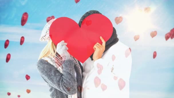 Couple Wearing Winter Clothes Holding Big Red Heart Front Face — Stock Video