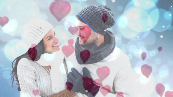 Joven Pareja Vistiendo Ropa Invierno Mirándose Entre Con Corazones Destellos — Vídeos de Stock