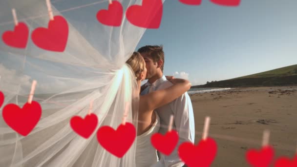 Digital Composite Attractive Young Couple Kissing Wedding Beach Hearts Forefront — Stock Video