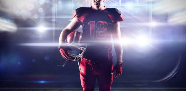 Amerikan futbolu arena karşı Rugby kask tutan doğ