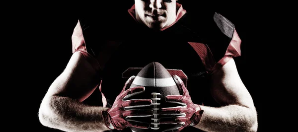 American Football Player Holding Rugby Black Background — Stock Photo, Image