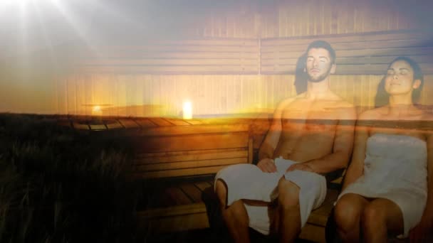 Compuesto Digital Pareja Disfrutando Sauna Con Paisaje Atardecer Fondo — Vídeos de Stock